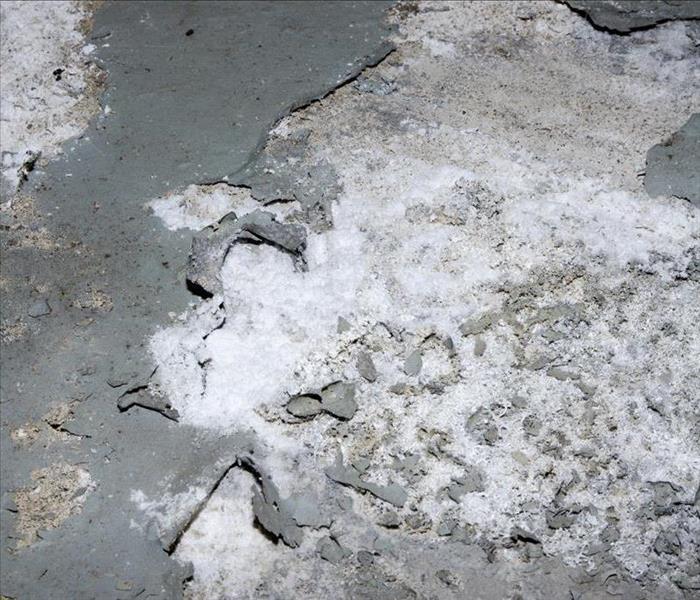 concrete water damaged, salty deposits